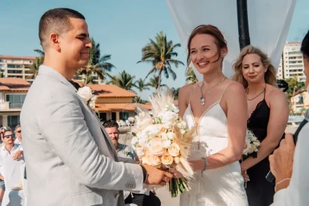 The exact moment when eyes meet and words are no longer needed. Standing hand-in-hand by the ocean as warm sunlight catches an authentic smile—capturing the raw, beautiful emotion of your vows in Puerto Vallarta