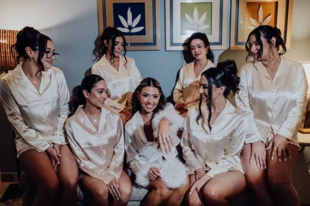 Laughter, excitement, and sisterhood in the final moments before the gown goes on. Surrounded by her inner circle in chic matching silk pajamas, the bride glows with joy as they share sweet getting-ready memories together in Puerto Vallarta