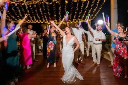 Pure energy, uninhibited joy, and a dance floor that never sleeps. Surrounded by glowing lights and vibrant laughter, this euphoric moment captures the ultimate party atmosphere of a dream destination wedding in Puerto Vallarta