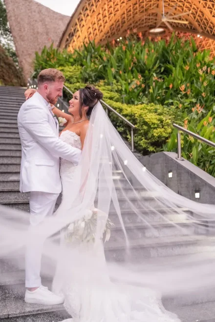 The ethereal movement of the veil, the gentle breeze, and a glance that speaks louder than words. A romantic, fairytale portrait capturing the effortless beauty and weightless joy of falling in love all over again