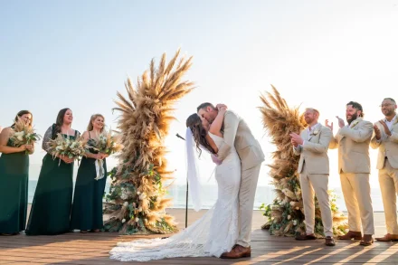 Sealed with a kiss and framed by the setting sun. The breathless, beautiful 'just married' moment you've always dreamed of, captured perfectly on the ocean's edge in Puerto Vallarta