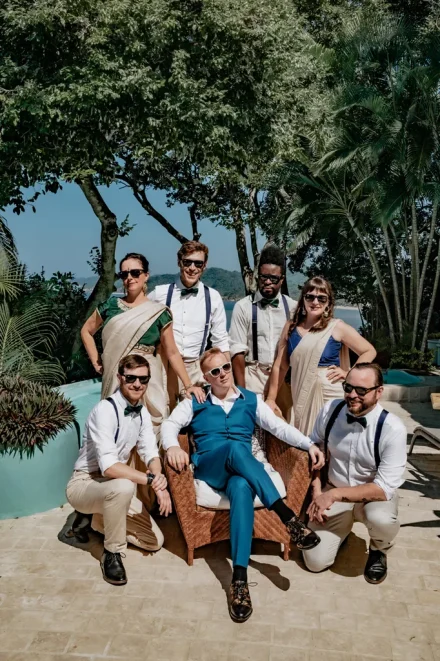 A stylish celebration of friendship in paradise! Surrounded by his closest friends dressed in chic tropical attire and sunglasses, the groom relaxes before stepping into his forever in Puerto Vallarta