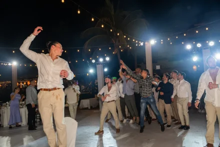 Pure excitement and high energy on the dance floor! The playful garter toss brings guests together in a joyous, lighthearted moment that adds unforgettable fun to your wedding night in Puerto Vallarta
