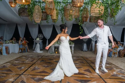 Their first dance as husband and wife, wrapped in the warm glow of handcrafted lights and magical evening vibes. A moment where time slows down, the dance floor is all theirs, and the celebration truly begins