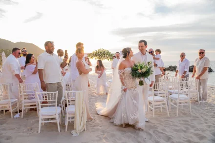 The very first steps into your new forever. Feel the warm ocean breeze, soft sand beneath your feet, and the joyful cheers of your loved ones as you walk hand-in-hand into the sunset as husband and wife
