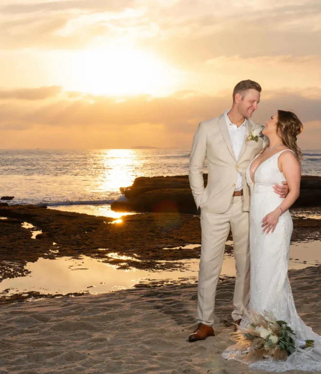 Wrapped in each other's arms as the sun paints the sky in shades of gold. A quiet, heartfelt moment of pure connection, capturing the peaceful romance of beginning forever together on the shores of Puerto Vallarta
