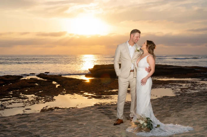 Wrapped in each other's arms as the sun paints the sky in shades of gold. A quiet, heartfelt moment of pure connection, capturing the peaceful romance of beginning forever together on the shores of Puerto Vallarta