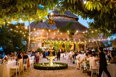 As twilight falls over Puerto Vallarta, the courtyard comes alive with magical warmth. Under a canopy of twinkling string lights and star lanterns, guests gather around the fountain to celebrate, share stories, and toast to an unforgettable evening of love and togetherness