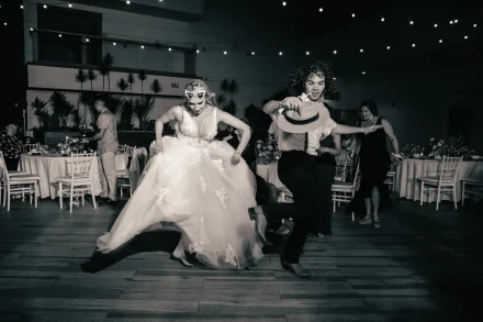High-energy joy on the dance floor. Captured in timeless black and white, the bride rocks heart-shaped sunglasses and lets loose with her guests—showing off the unforgettable, high-vibe party energy of a Puerto Vallarta wedding celebration