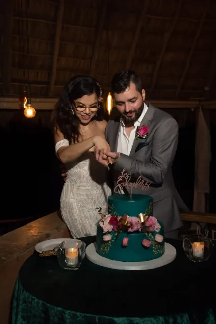 A sweet milestone to celebrate an extraordinary day. Hand in hand under warm ambient reception lights, slicing into your wedding cake in Puerto Vallarta creates a timeless tradition filled with joy, flavor, and romance