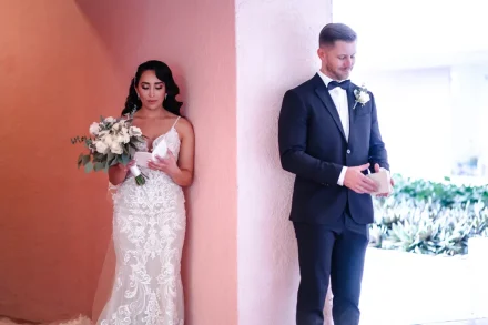A quiet heartbeat before forever. Standing on opposite sides of a wall, holding back tears as you read each other's heartfelt words—this tender first touch captures the anticipation, emotion, and deep intimacy of your Puerto Vallarta wedding day