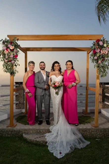 Surrounded by the people who mean the world to you, beneath floral arches and the endless ocean sky. These are the timeless family portraits that anchor your destination wedding in Puerto Vallarta, preserving the love and connection of your most cherished bonds