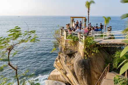 Perched on dramatic ocean cliffs, this is where destination wedding dreams take flight. Exchange your forever promises suspended above crashing waves and infinite horizons for a moment as grand as your love story in Puerto Vallarta