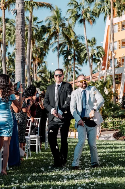 Setting a fun, joyous tone for the ceremony! Walking down the aisle with style and throwing flower petals to the delight of laughing guests adds a lighthearted, memorable spark to your Puerto Vallarta wedding celebration
