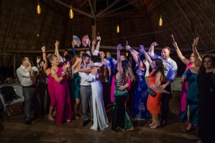 Surrounded by the warmth, energy, and cheer of your closest friends and family on the dance floor. An unforgettable night of celebration under the palapa in Puerto Vallarta, where every smile and cheer honors the love you share